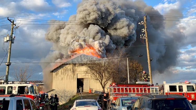 Heavy smoke seen 'for quite some distance' after empty warehouse goes up in flames