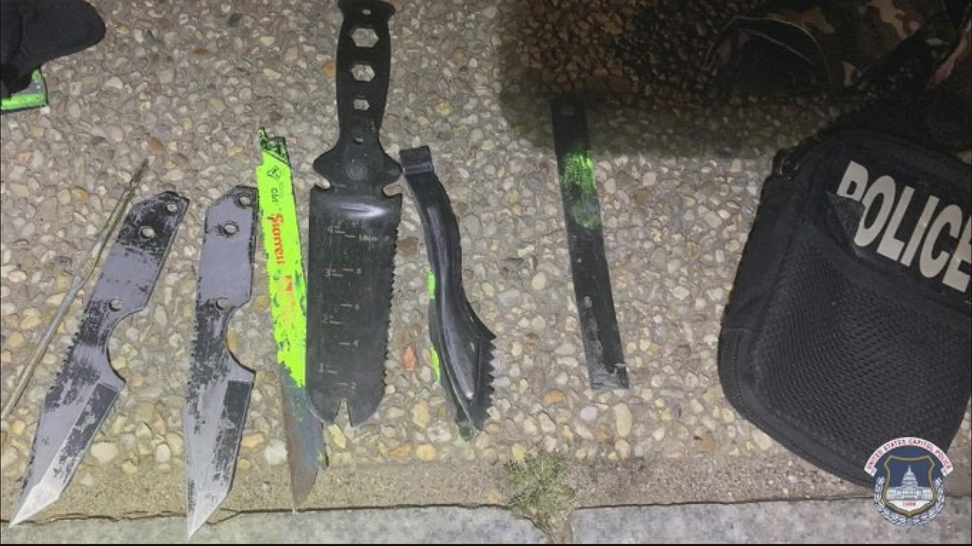 A man, suspected of impersonating a police officer, was found with a "stash of knives" Monday after the department receiving a tip from the USSS.