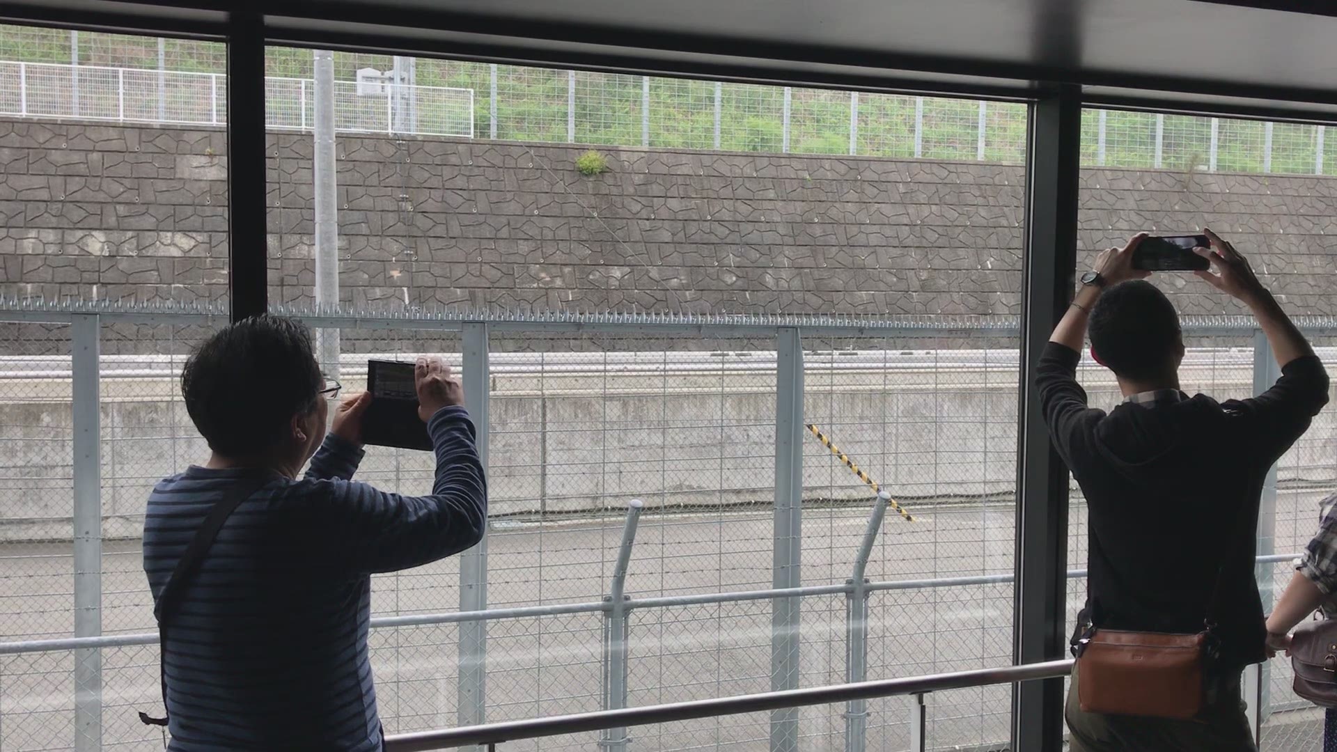 SCMaglev in Japan shoots past spectators in the blink of an eye.