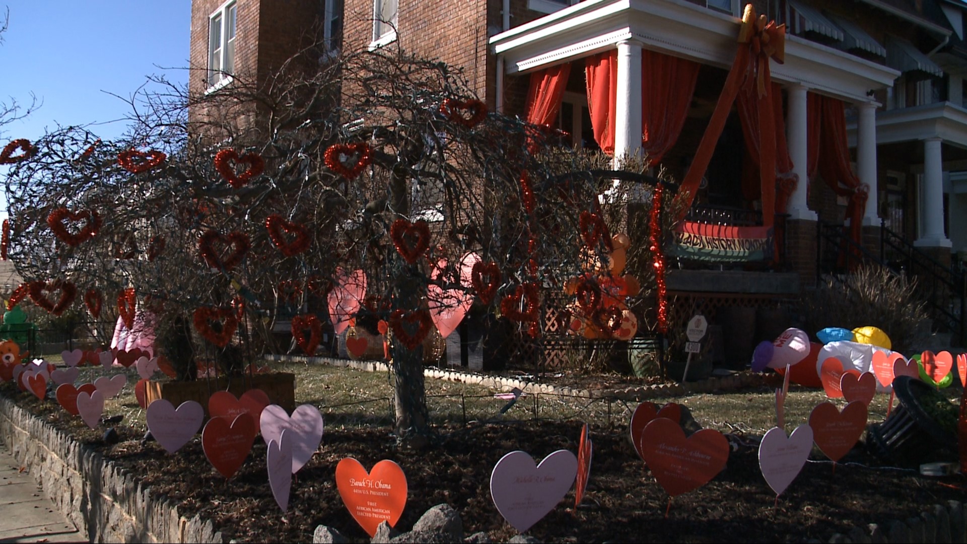 One woman hopes to inspire love and curiosity with a yard display celebrating figures in Black history combined with Valentine's Day.
