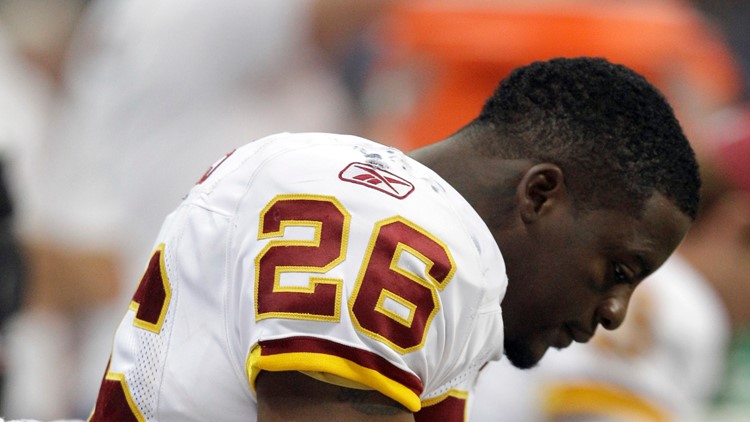 Former Redskins Clinton Portis surrenders to authorities