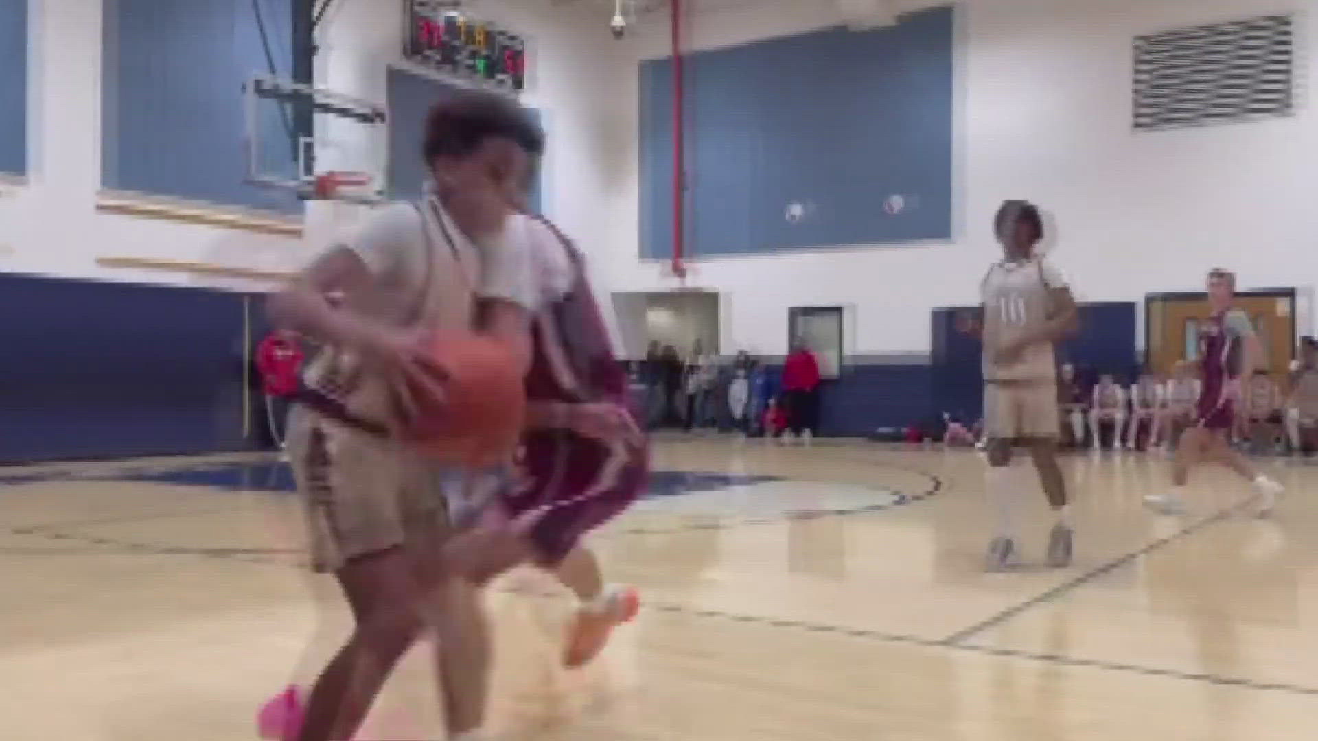 Loudoun County mom defends running on court during youth hoops game