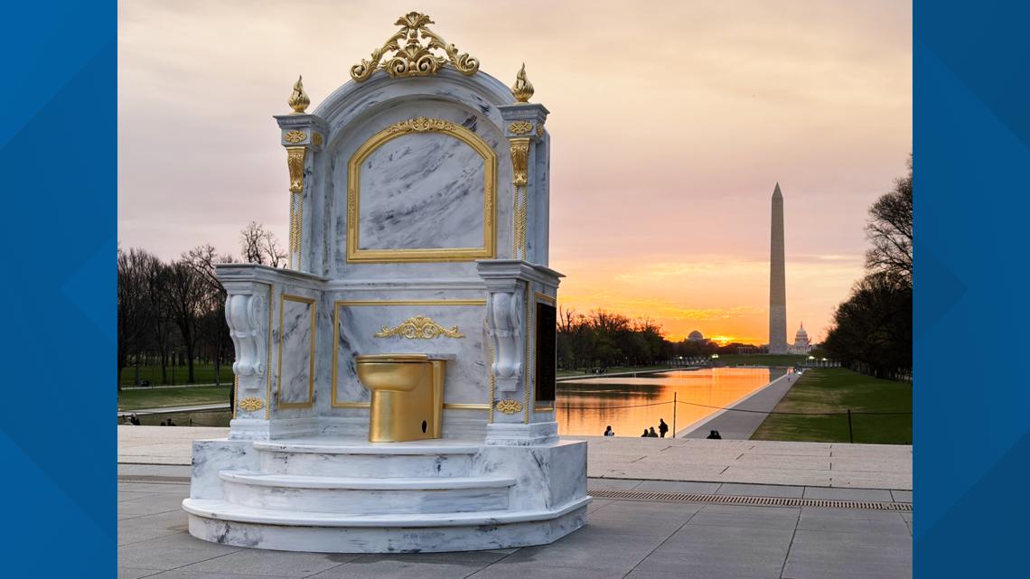 Giant gold toilet appears in front of Lincoln Memorial