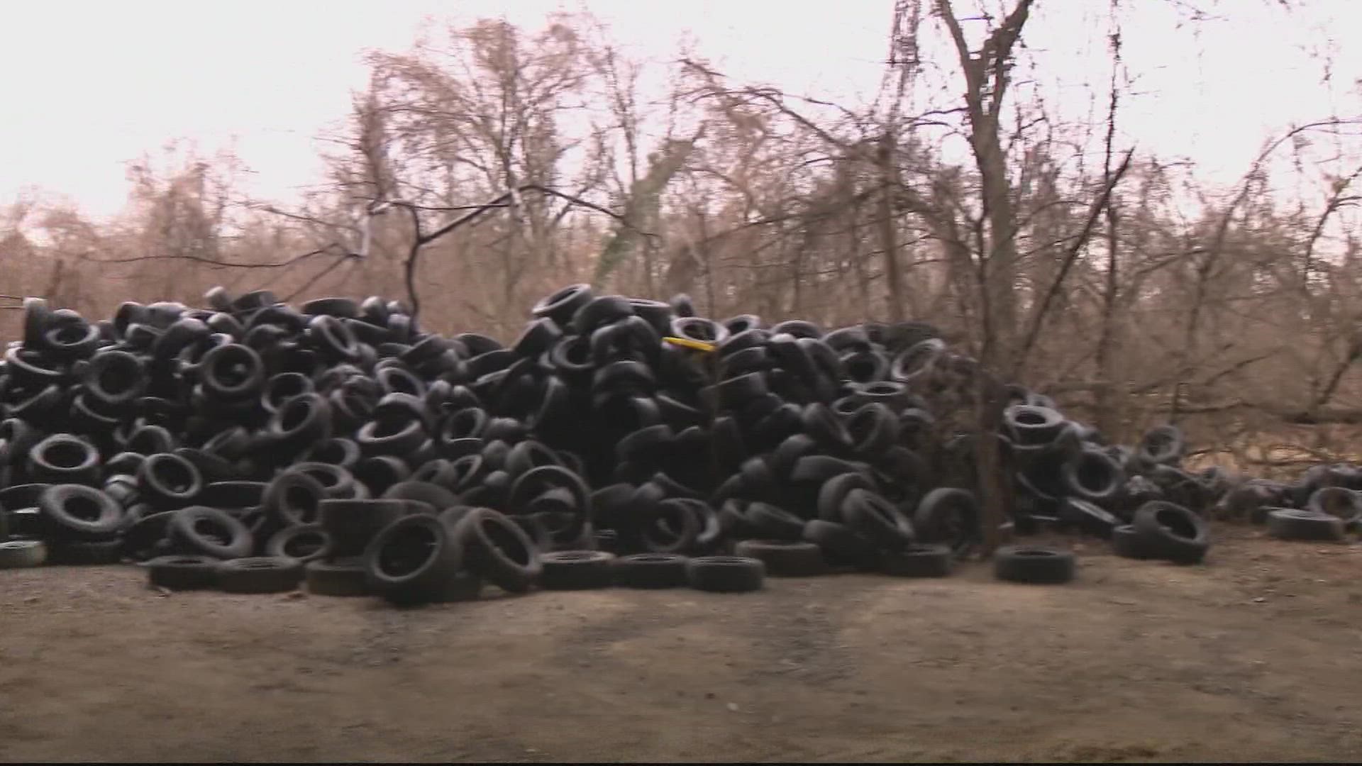 Community groups discovered a mountain of tires illegally dumped in Anacostia Park. Now, the National Park Service is working to clean them up.