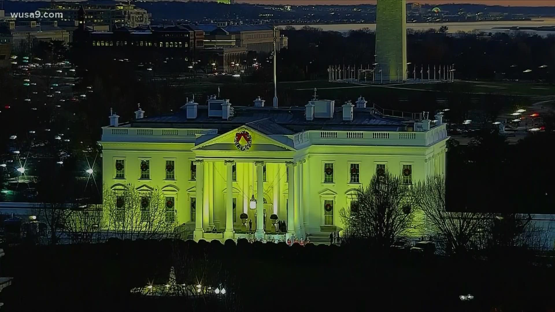 white house lit up in gay pride colors