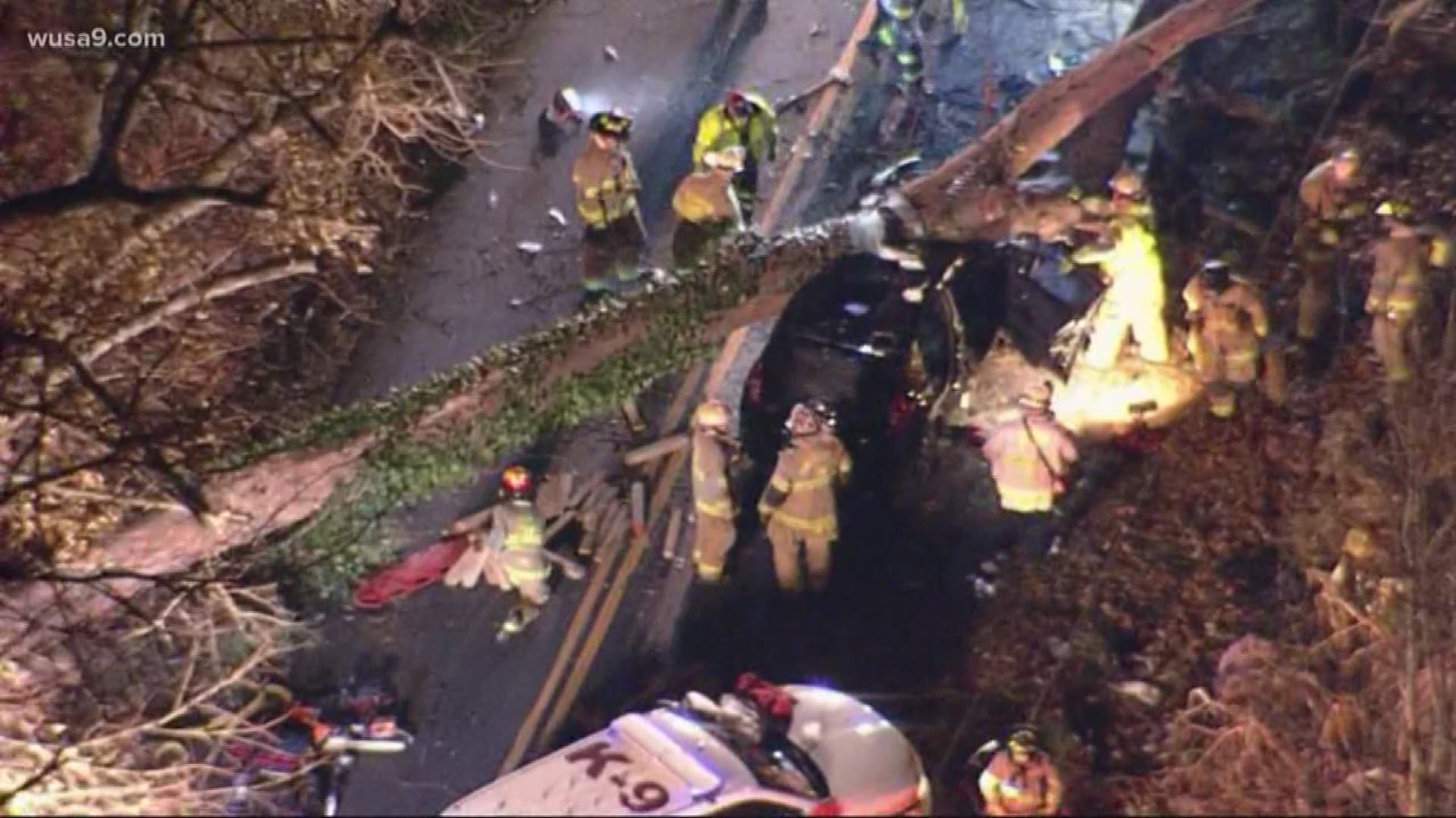 Upon arrival, crews found a tree on top of the SUV where two people were left trapped inside. One person was able to escape before crews arrived