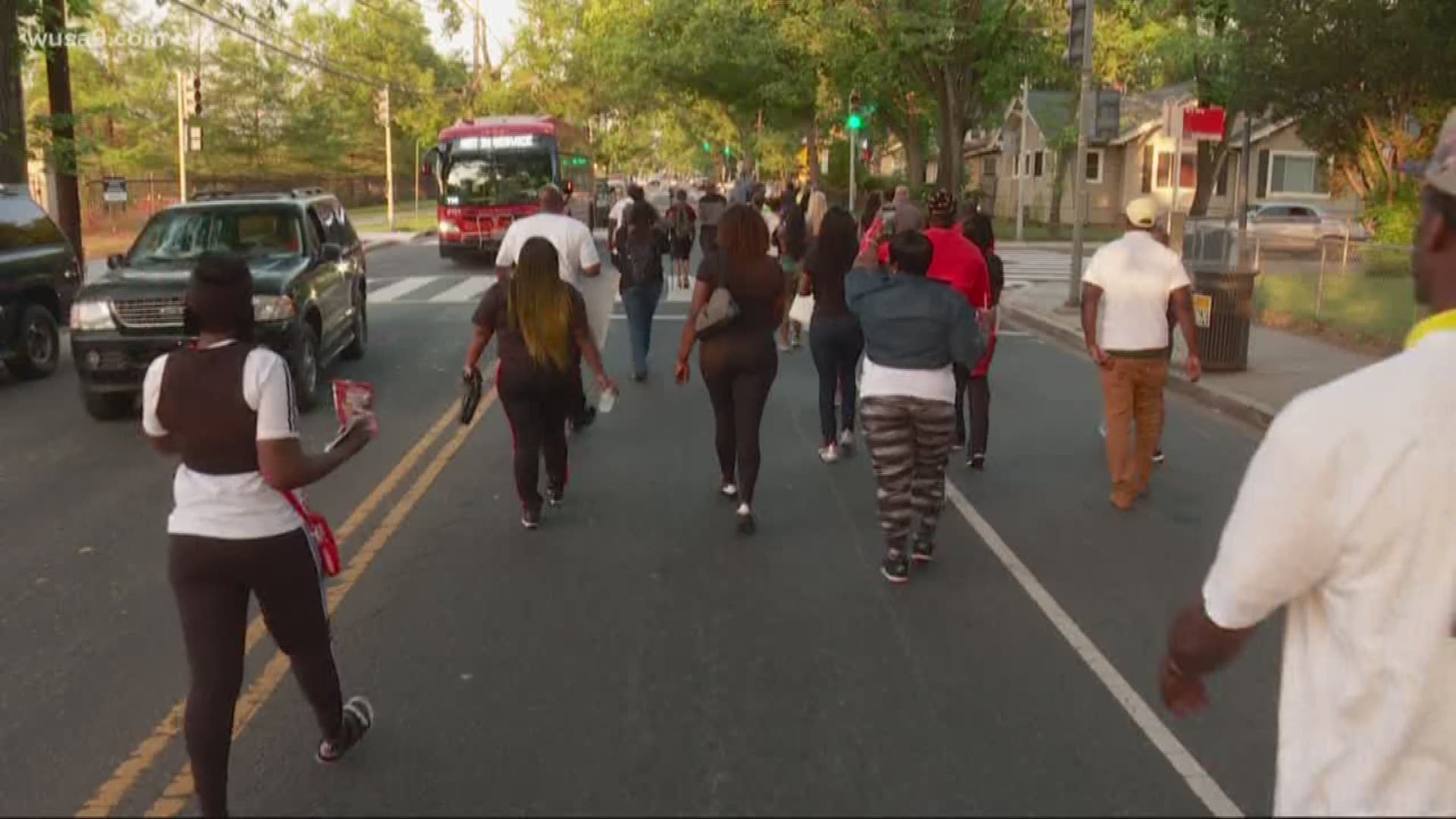 More than 50 people walked down Alabama Avenue SE in DC's Congress Heights neighborhood.