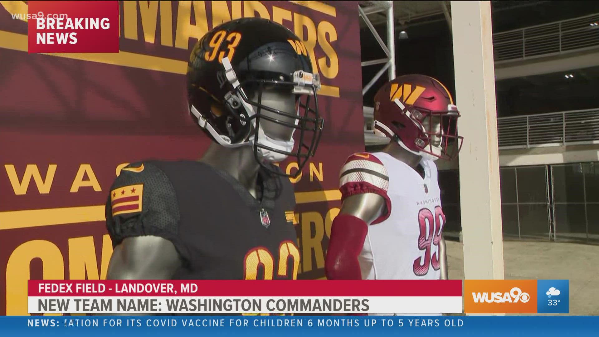 Kristen Berset-Harris shows off the new uniforms for the newly named Washington Commanders at Fed Ex Field.