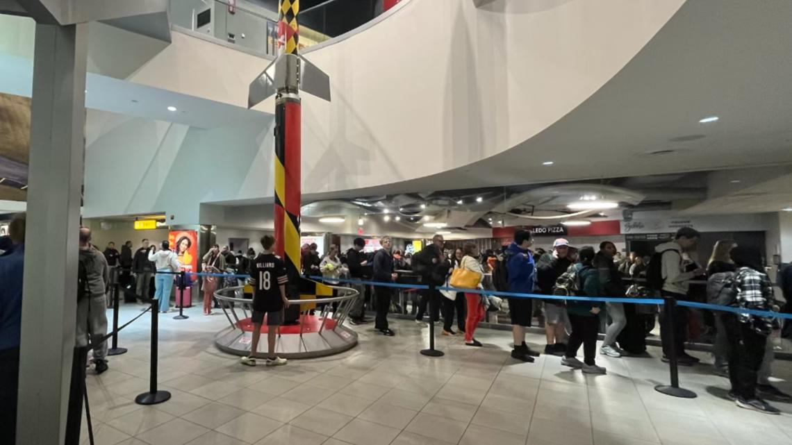 BWI warns travelers to arrive 4 hours early as security lines are seen out the airport doors