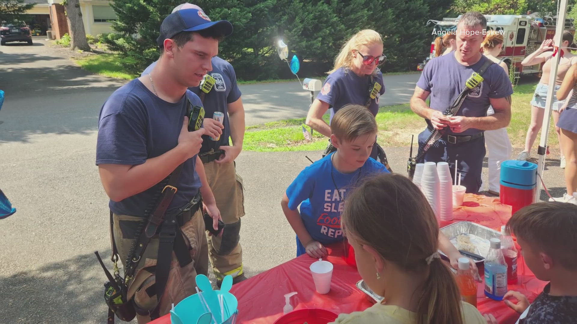 This 8-year-old organized a shaved ice stand, not only to cool off his neighbors, but also to help first responders in his community.