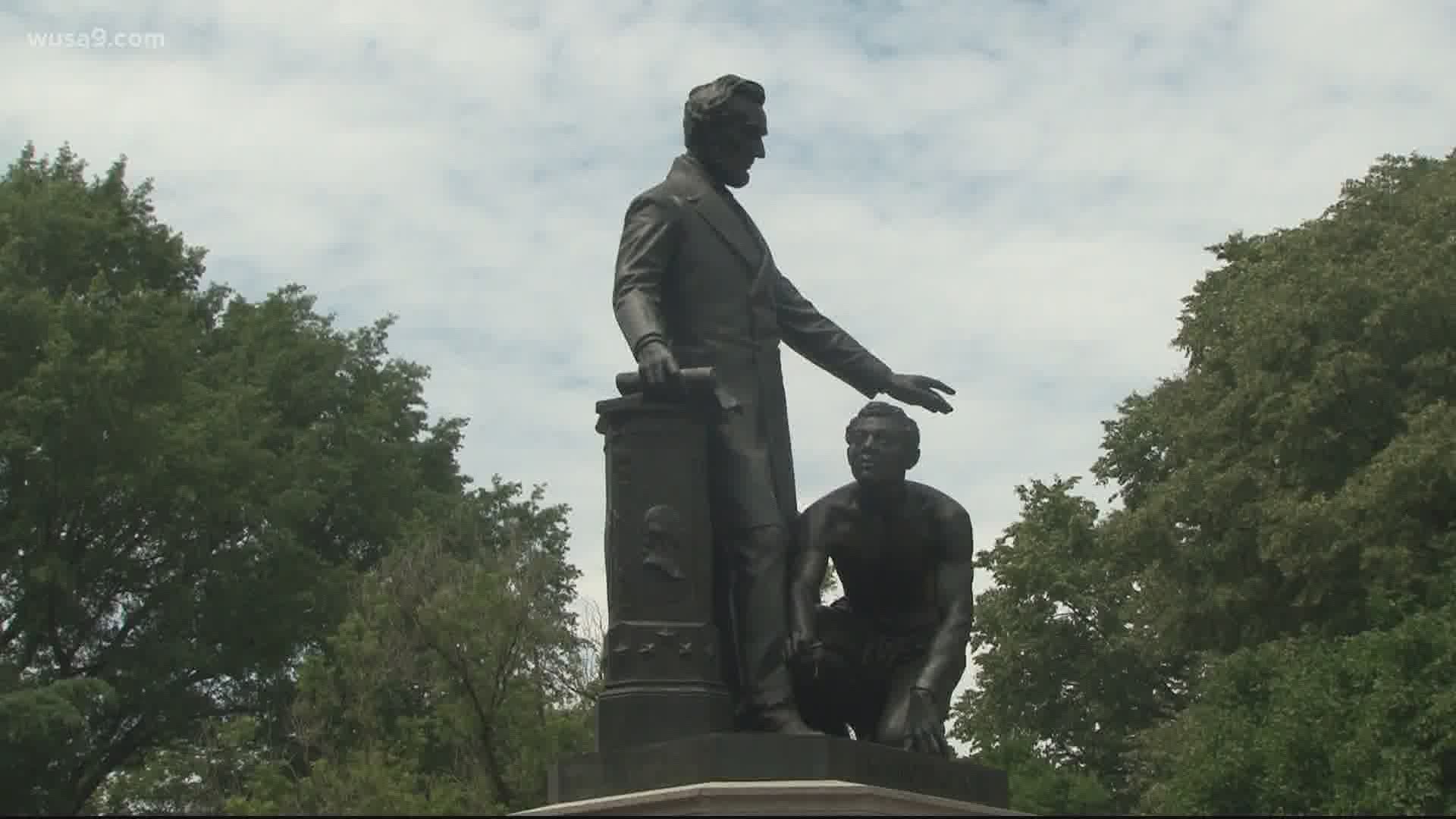 As an online petition makes its rounds, history buffs emerge to speak out against it in hopes of preserving the legacy of freed slaves who funded the statue.
