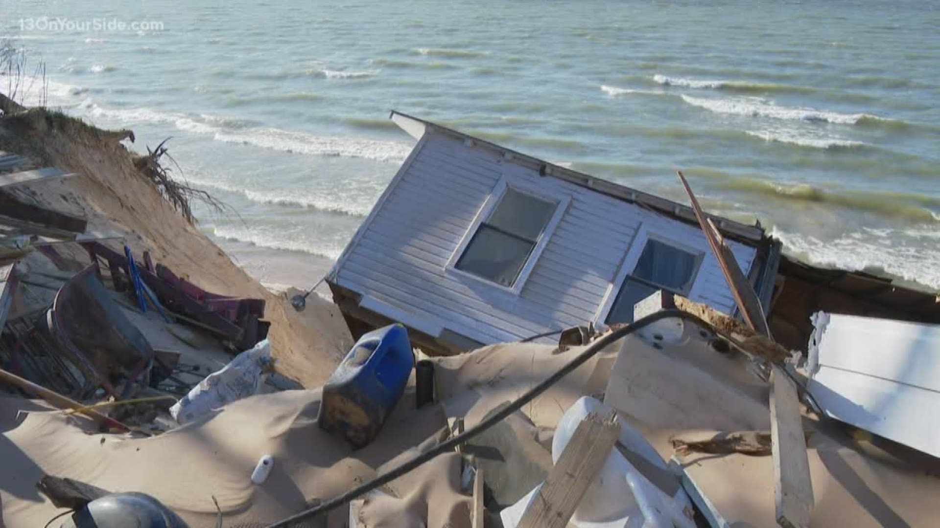 Neighbors say the home was hanging off the edge for some time before it collapsed.