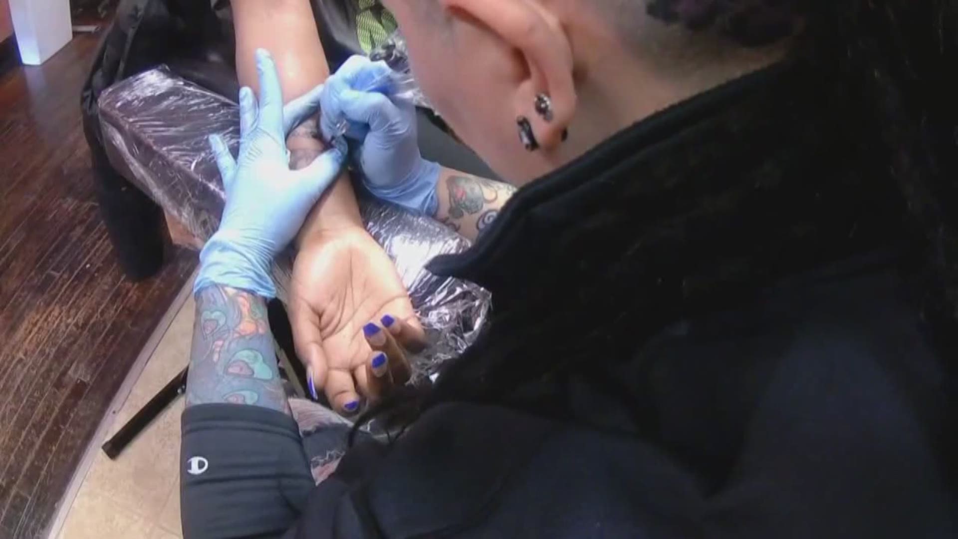 How a tattoo artist wants to erase stigma